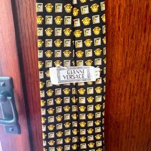 Gianni Versace tie.